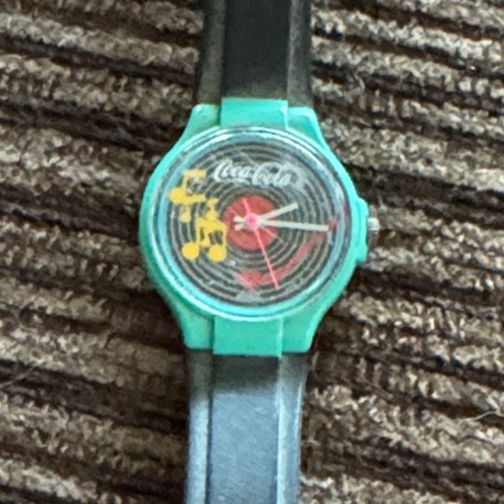 Coke cola Smartwatch with Musical Theme - Green and Black